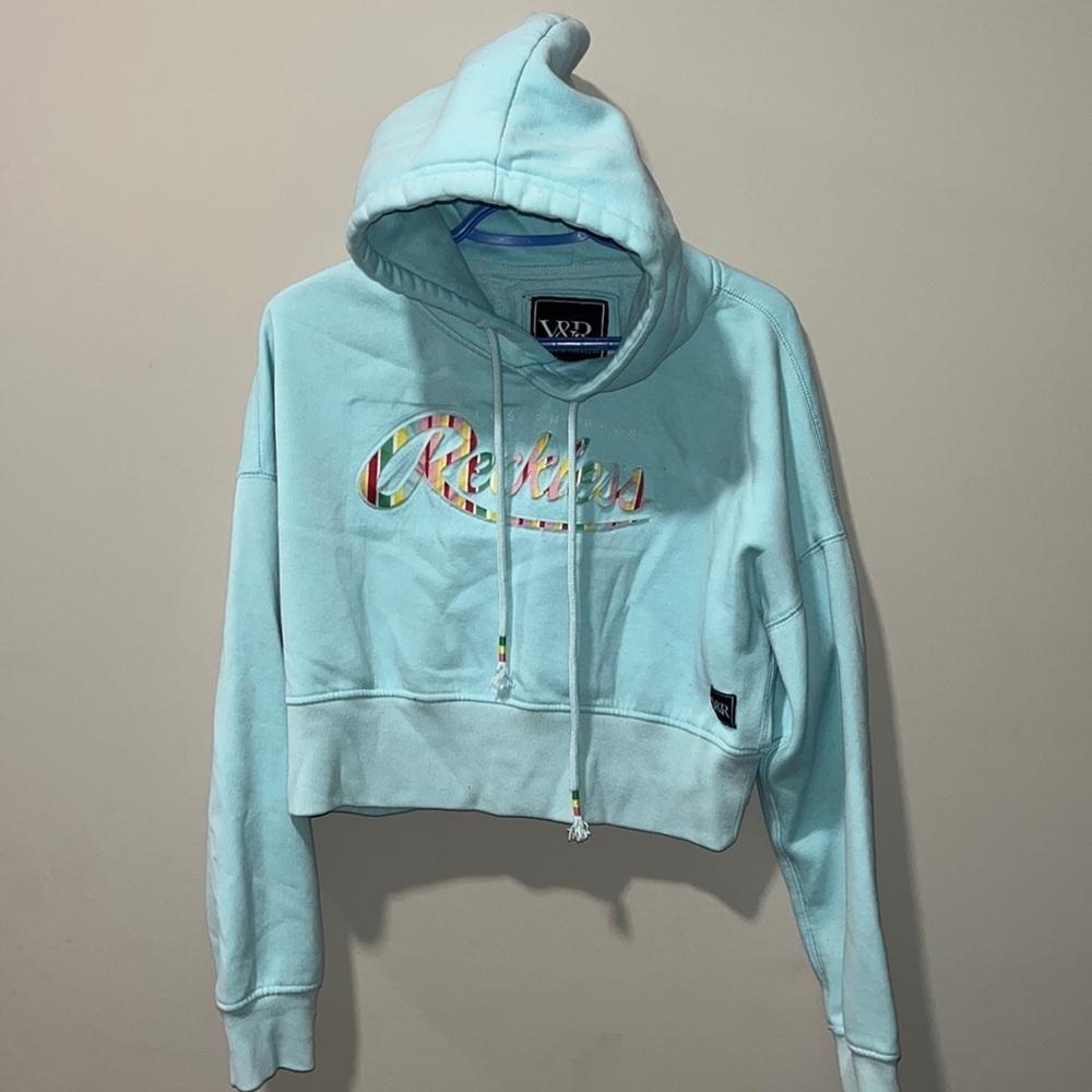 Women’s small young  and reckless cropped hoodie